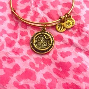 Alex and Ani gold “Ouroboros” bracelet
